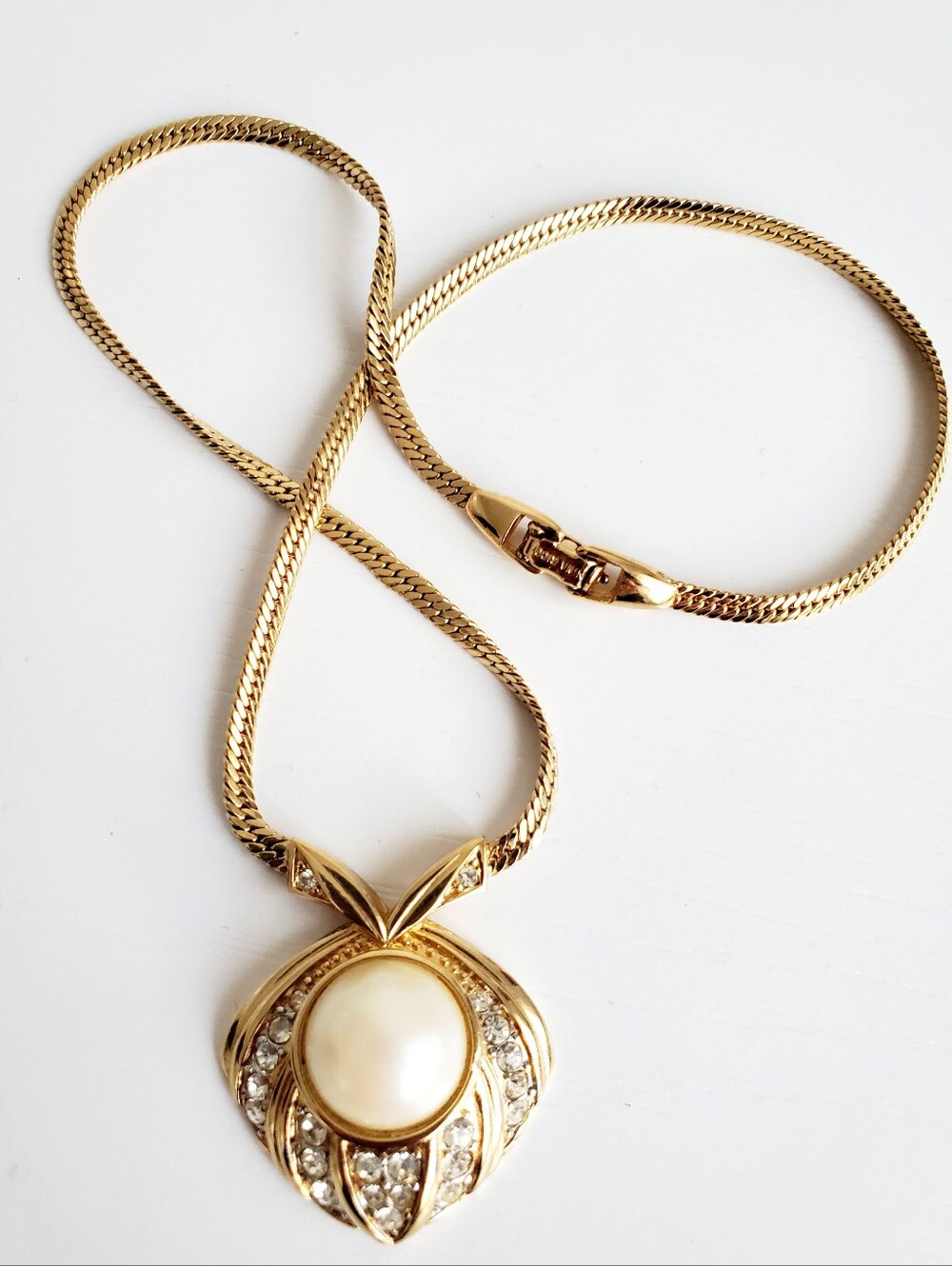Nina Ricci Gold-Tone Pearl Pendant Necklace with Crystal Details